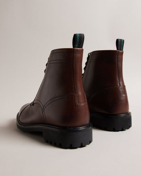 JOESIF-Boots-Step up your footwear game with our JOESIF leather boots. Crafted from top grain leather, these boots boast a lace fastening with eye-catching two-tone laces that add a touch of unique charm, while the heel pull tab ensures easy on-and-off. Leather boots Lace fastening Two-tone laces Ombre toe Webbing heel pull tab Vulcanised rubber sole- Ted Baker Romania